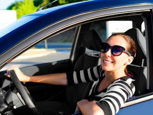 Woman Driving a Car