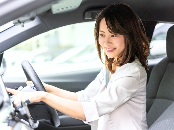 Woman Driving a Car