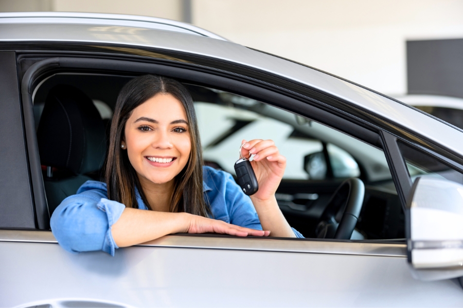 Woman with a Rental Car