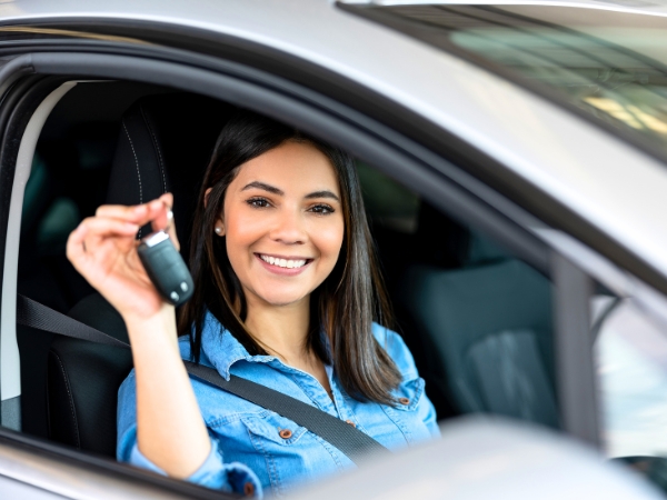 Woman with a Rental Car